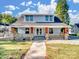 Beautiful light blue two-story home with a front porch at 709 Bringle Ferry Rd, Salisbury, NC 28144