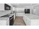 Modern kitchen with granite countertops and white cabinets at 709 Bringle Ferry Rd, Salisbury, NC 28144