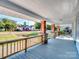 Charming front porch with wooden railings and stone pillars at 709 Bringle Ferry Rd, Salisbury, NC 28144