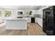 Modern kitchen with granite countertops and white cabinets at 709 Bringle Ferry Rd, Salisbury, NC 28144
