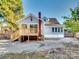 Updated home features new siding, deck, and landscaping at 709 Bringle Ferry Rd, Salisbury, NC 28144