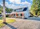 Charming light blue home with a gravel driveway at 709 Bringle Ferry Rd, Salisbury, NC 28144