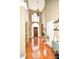 Two-story entryway with hardwood floors and grand staircase at 4108 Cheshire Glen Dr, Monroe, NC 28110