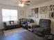 Living room with hardwood floors, gray couches and armchairs at 4986 6Th Sw St, Catawba, NC 28609