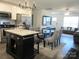 Open concept kitchen and dining area with gray chairs at 4986 6Th Sw St, Catawba, NC 28609