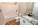 Bathroom featuring a shower/tub combo, vanity, and granite countertop at 4916 Southview Dr, Hickory, NC 28602