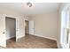 Bedroom with a closet, wood-look flooring, and natural light at 4916 Southview Dr, Hickory, NC 28602