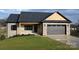 Charming two-story home with a mix of brick and wood siding, attached garage, and front yard at 4916 Southview Dr, Hickory, NC 28602