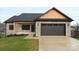 Attractive home with a brick and wood exterior, porch, and garage at 4916 Southview Dr, Hickory, NC 28602