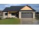 Charming two-story home with a mix of brick and wood siding, attached garage, and front yard at 4916 Southview Dr, Hickory, NC 28602