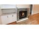 Modern fireplace with gray tile and white mantel at 4916 Southview Dr, Hickory, NC 28602
