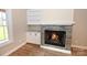 Fireplace with built-in shelving and cabinets at 4916 Southview Dr, Hickory, NC 28602