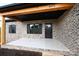 Front porch with wooden posts, black roof, and brick exterior walls, showing the front door at 4916 Southview Dr, Hickory, NC 28602