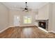 Bright living room with fireplace and hardwood floors at 4916 Southview Dr, Hickory, NC 28602