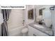 Bathroom with granite countertop and black accents at 5066 Silver Creek Ln, Denver, NC 28037