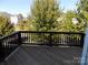 Wooden deck overlooking a residential neighborhood at 141 Rock Ridge Ln, Mount Holly, NC 28120