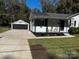 Updated home with detached garage and basketball hoop at 810 N Woodland Dr, Lancaster, SC 29720