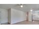 Bright living room with ceiling fan and wood floor at 4605 Coronado Dr # M, Charlotte, NC 28212