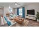 Living room features stylish furniture and hardwood floors at 4605 Coronado Dr # M, Charlotte, NC 28212