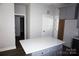 Kitchen island with white quartz countertop and gray cabinets at 1022 W C St, Kannapolis, NC 28081
