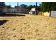 Large backyard with straw ground cover at 1022 W C St, Kannapolis, NC 28081