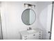 Bathroom with vanity, round mirror, and shower at 1022 W C St, Kannapolis, NC 28081