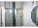 Shower with marble and blue glass tile detail at 1022 W C St, Kannapolis, NC 28081