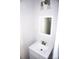 Small bathroom with white vanity, sink and mirror at 1022 W C St, Kannapolis, NC 28081