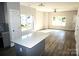 Bright and spacious living room with hardwood floors and lots of natural light at 1022 W C St, Kannapolis, NC 28081