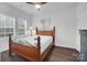 Comfortable bedroom with classic furnishings and ample natural light at 1717 Slippery Rock Ln, Monroe, NC 28112