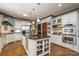 Eat-in kitchen featuring granite countertops and stainless steel appliances at 178 Stonebridge Dr, New London, NC 28127