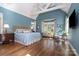 Large main bedroom with high ceilings, hardwood floors and ample natural light at 178 Stonebridge Dr, New London, NC 28127