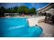 Community pool with waterslide and ample lounge space at 178 Stonebridge Dr, New London, NC 28127