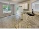 Kitchen with granite countertops and access to backyard at 3219 Irwin Valley Ct, Charlotte, NC 28269