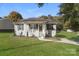 Charming single-story home with a covered porch and well-manicured lawn at 788 W Pine Cir, Statesville, NC 28677