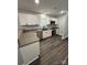 Modern kitchen with white cabinets and gray countertops at 560 2Nd St, Chester, SC 29706