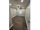 Bright bedroom with ceiling fan and laminate wood flooring at 560 2Nd St, Chester, SC 29706