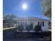 Newly renovated home with front porch and carport at 560 2Nd St, Chester, SC 29706