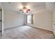 Spacious bedroom with carpet, ceiling fan, and window at 5225 Rocky River Crossing Rd, Harrisburg, NC 28075