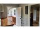 Laundry room with built-in cabinets, wood countertop, and access to a deck at 87 Woodsdale Se Pl, Concord, NC 28025