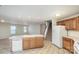 Kitchen with island, stainless steel appliances, and wood cabinets at 135 Anastasia Ln, Lincolnton, NC 28092