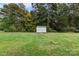 Spacious backyard with shed and large grassy area at 2117 Charlotte Hwy, Mooresville, NC 28117