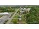 Aerial view of a ranch home on a lot with mature trees and road access at 2117 Charlotte Hwy, Mooresville, NC 28117