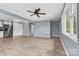 Spacious living area with tile floors and neutral walls at 2117 Charlotte Hwy, Mooresville, NC 28117