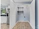 Bright laundry room with washer/dryer hookups and built-in shelving at 2117 Charlotte Hwy, Mooresville, NC 28117