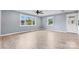 Living room with tile floors, neutral walls, and a ceiling fan at 2117 Charlotte Hwy, Mooresville, NC 28117