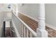 Spacious loft area with hardwood floors and railing at 213 N Holland St, Dallas, NC 28034