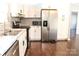 Modern kitchen with stainless steel appliances and white shaker cabinets at 2580 Lewis Dr, Lancaster, SC 29720