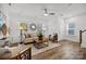 Spacious living area with hardwood floors, neutral color palette, and ample natural light at 4008 Crooked Spruce Ct, Matthews, NC 28105