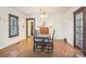 Charming dining room with hardwood floors and a view into the kitchen at 1080 Harper Gault Rd, Rock Hill, SC 29730